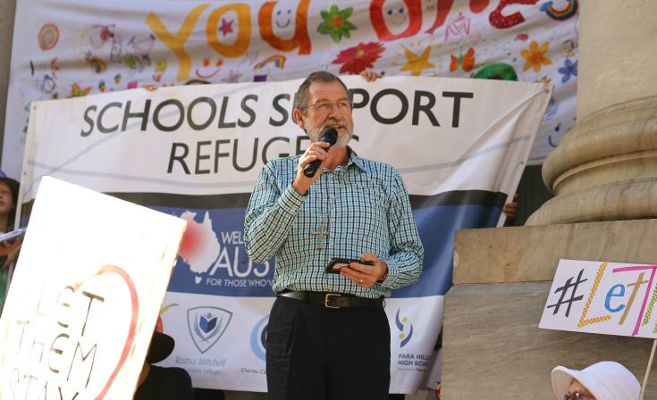 Uniting Church President Stuart McMillan addresses people gathered on Parliament House steps for the #LetThemStay snap rally in Adelaide on Thursday 5 February.